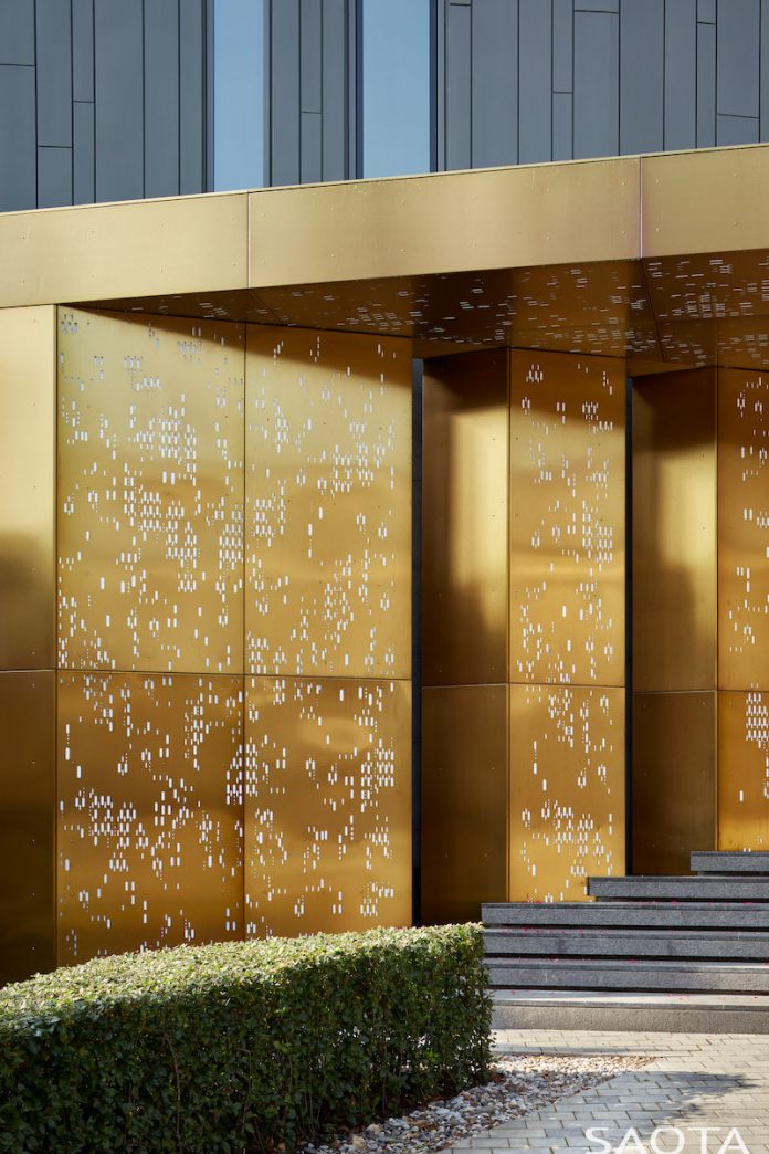 gold entrance silver pine by saota